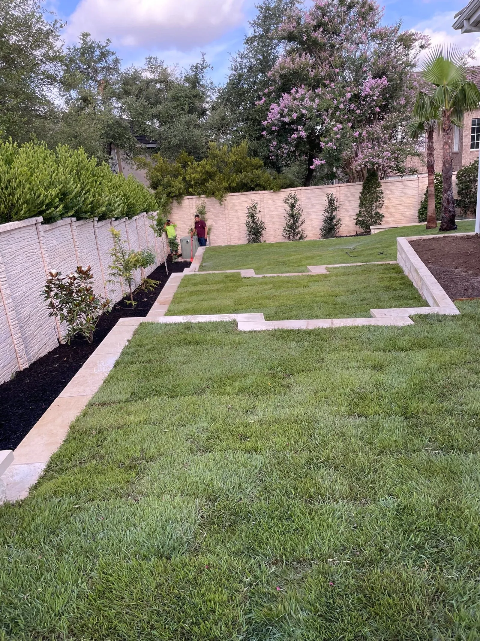Wood privacy fence installation