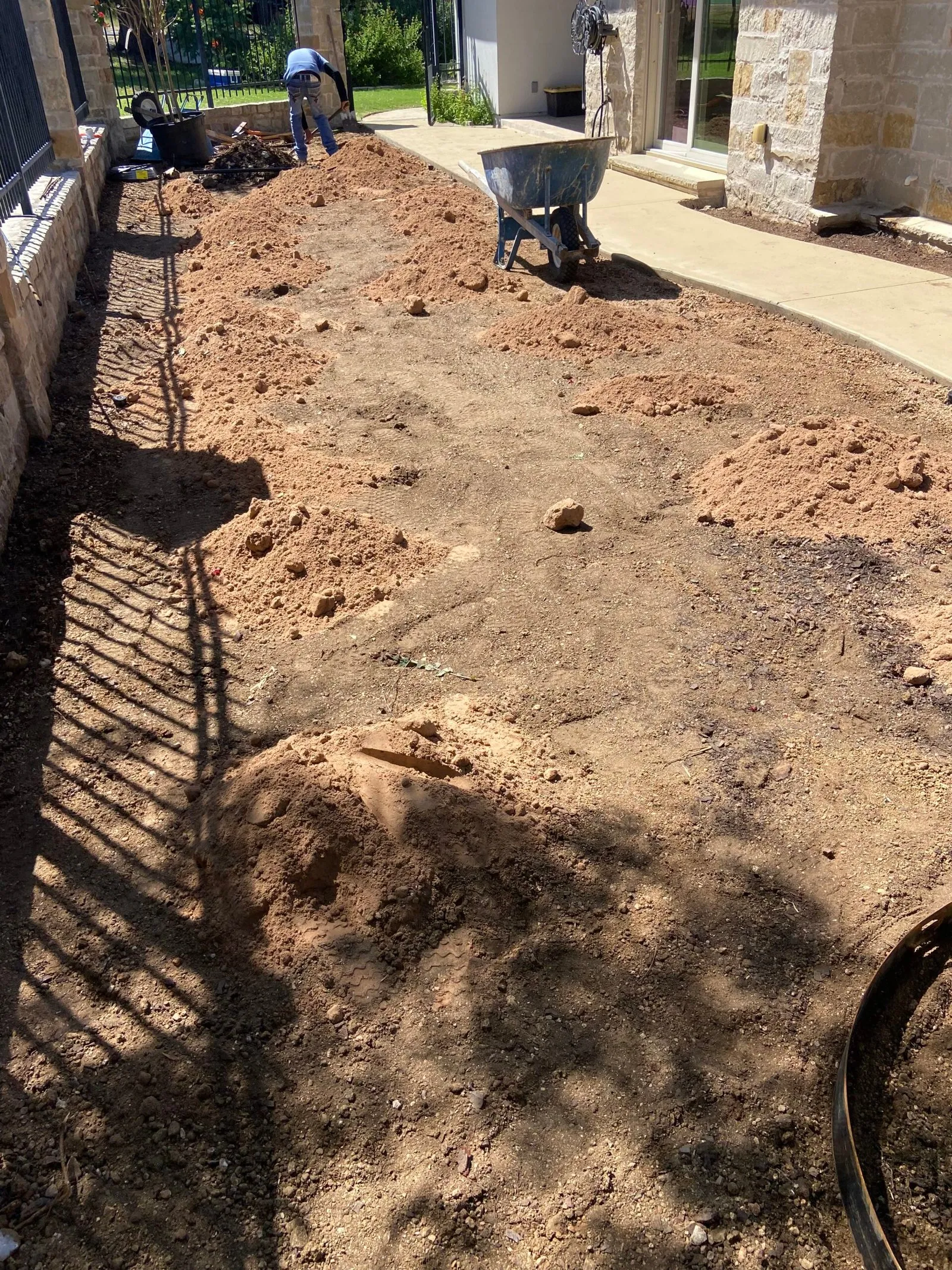 Custom stone masonry retaining wall installation