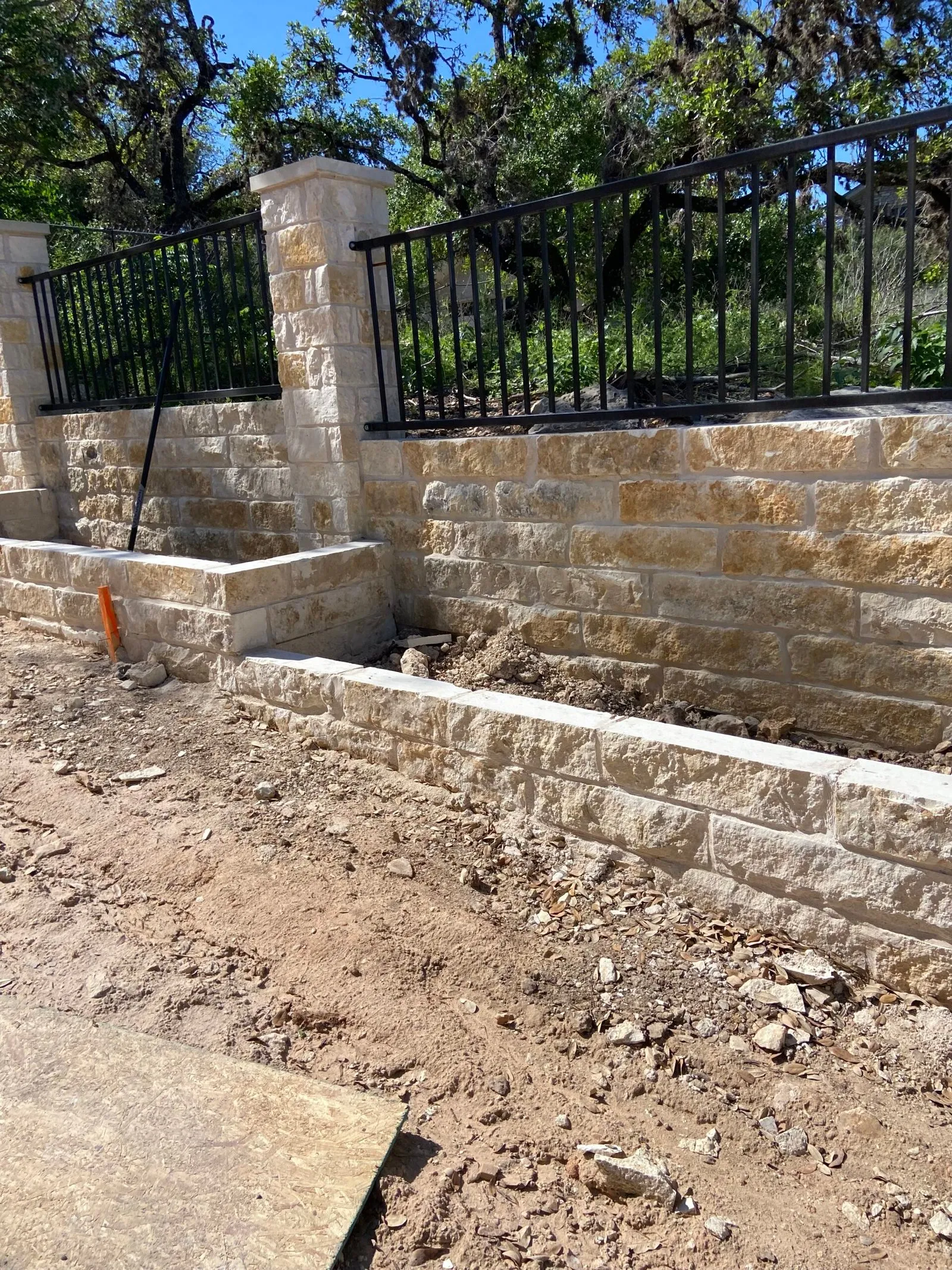 Wood pergola installation in backyard
